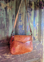 TAN TOOLED LEATHER BAG